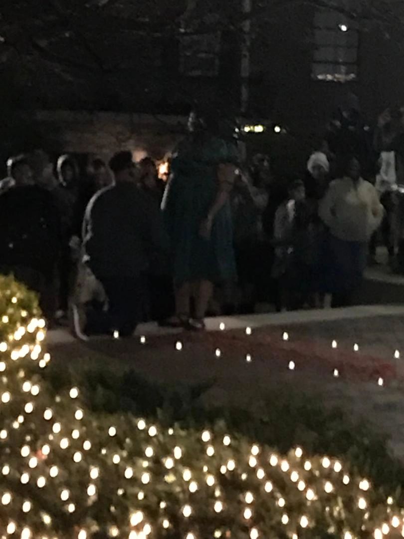 Man on one knee proposing to his sweetheart