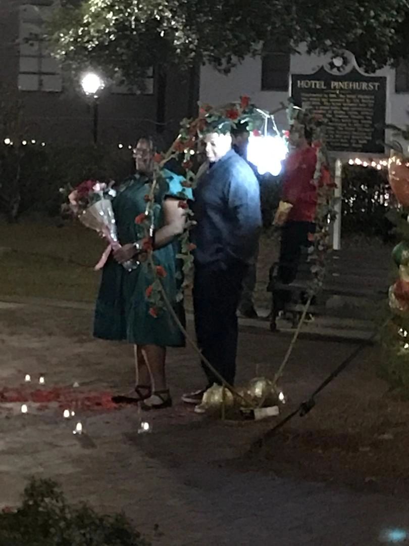 Couple posing after he proposed