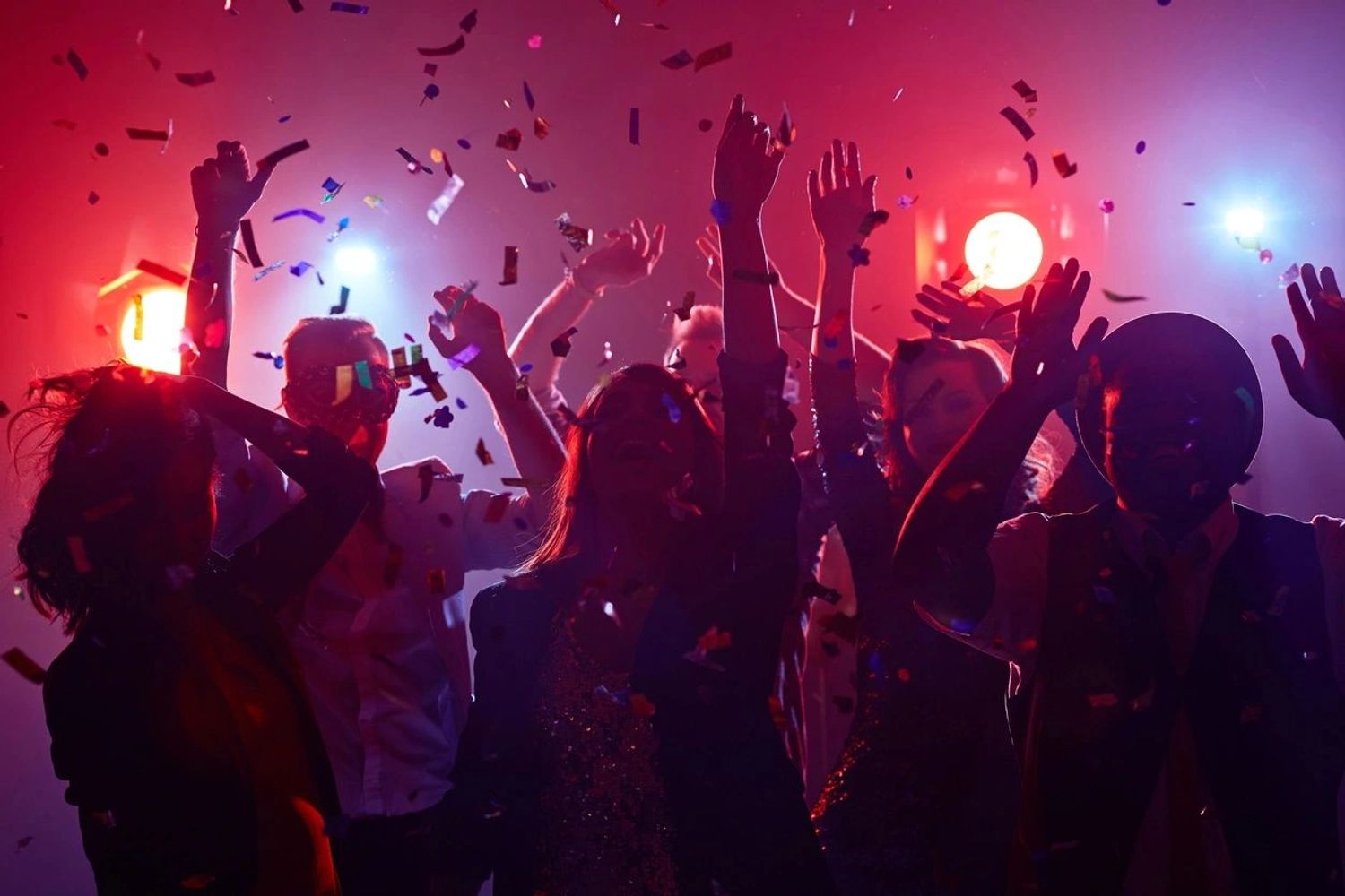 Young people dancing in night club