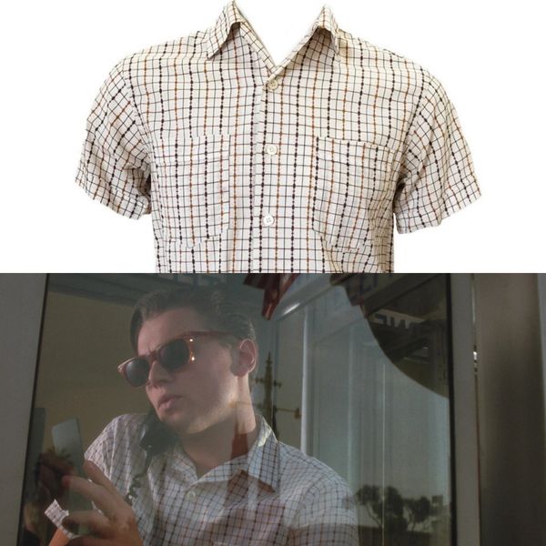 Plaid short-sleeve shirt and a scene of a man wearing it.