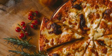 A wood-cooked cheese thin-crust pizza