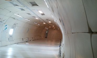 The forward section with seats and overhead compartments removed, which is where the zero gravity ex