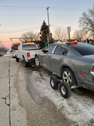 All wheel drive vehicle on dollies-Photo Gallery of Legit Towing -  Legit Towing
