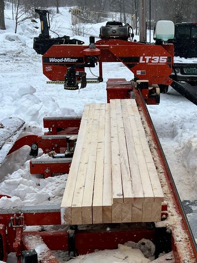 Portable sawmill in winter.