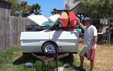 Pete and I spent most of today figuring out how to carry three kayaks on a Pop-up Camper
