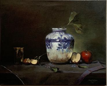 Still life study by Sharon Kretchmar of a white vase with blue detail on a side table with apples an