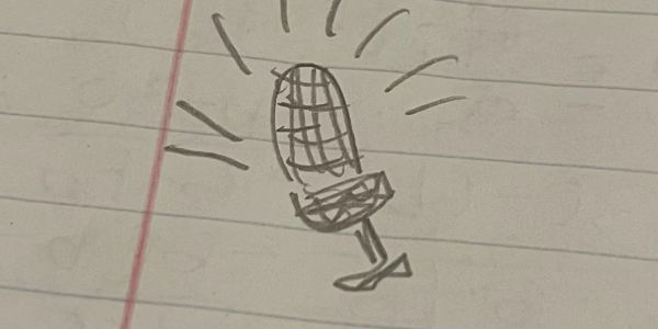 Hand-drawn microphone sketch on lined paper.