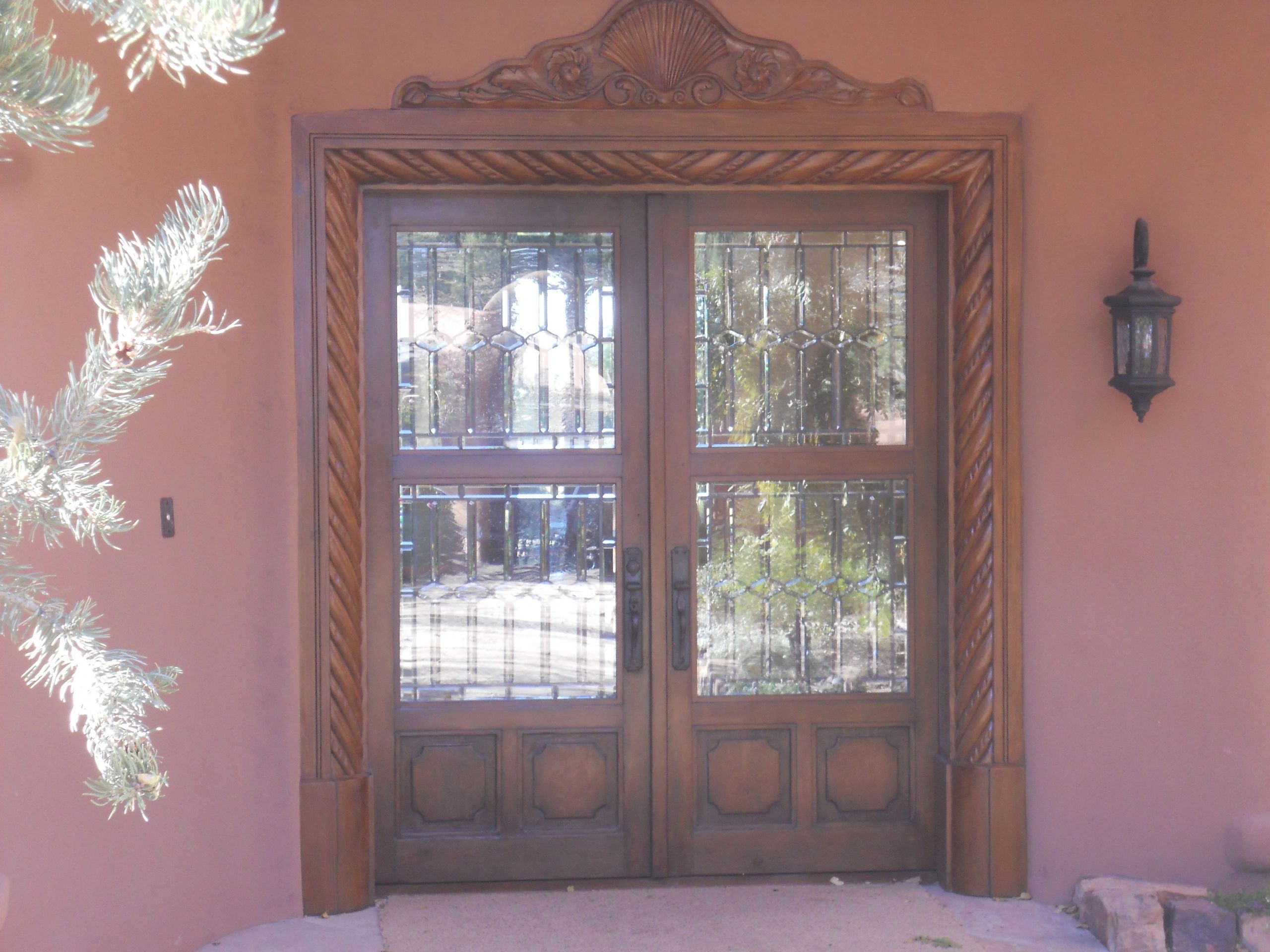 double door entry with beveled leaded glass