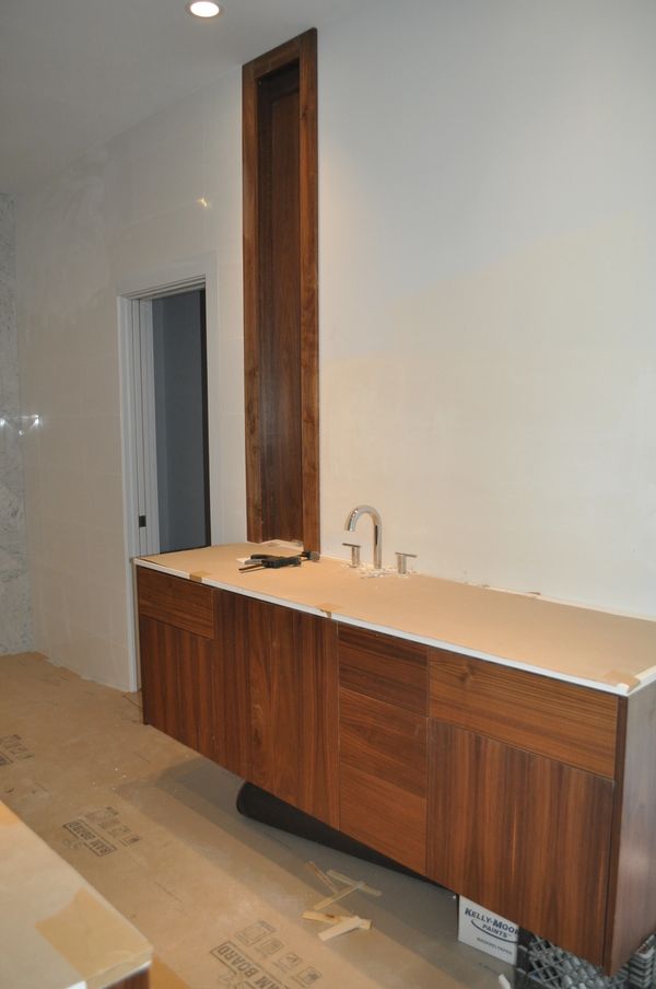 Walnut modern style vanity cabinet with slab doors