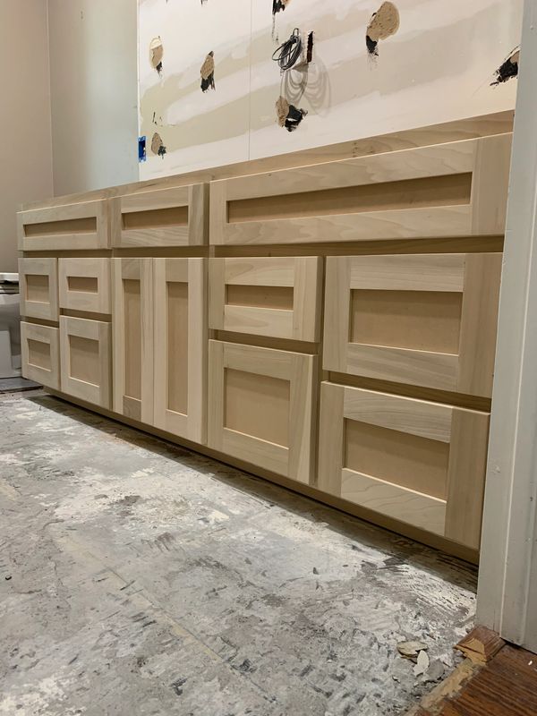 Paint grade vanity cabinet with shaker doors and drawer fronts