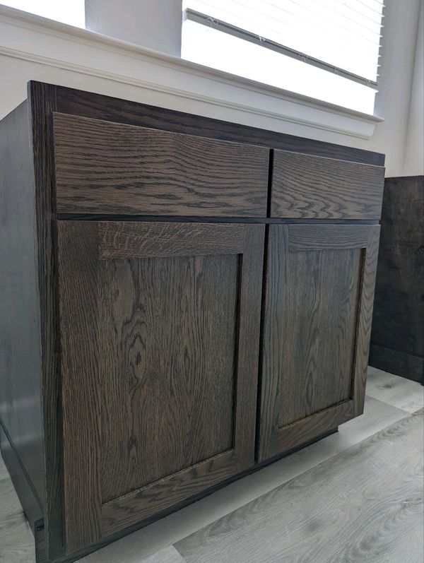 O stained white oak base cabinet 