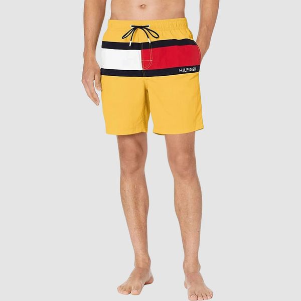 Tommy Hilfiger Men's 7" Swim Trunks. Create a classic beach-ready look in these swim trunks