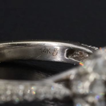 Close-up of a ring stamped with "14K".