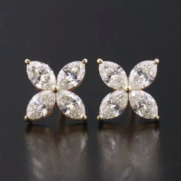 Elegant flower-shaped diamond stud earrings.