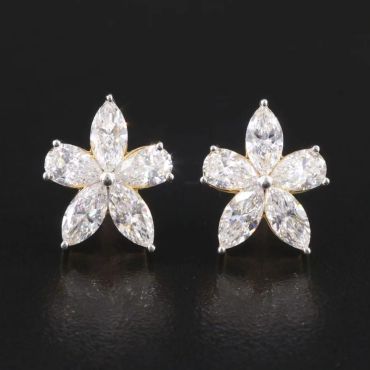 Elegant flower-shaped diamond earrings.