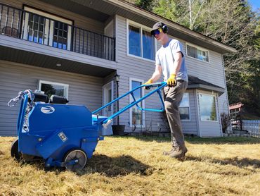 Residential lawn aeration service enhances soil structure and promotes air and nutrient absorption