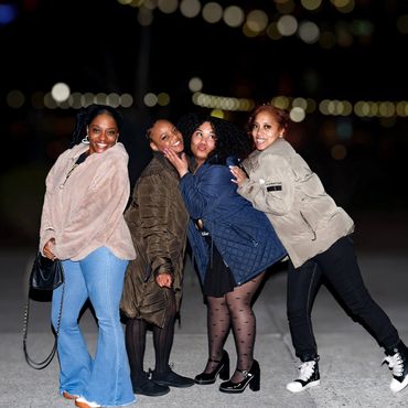 Four young girls outside