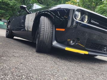 A sleek, black car