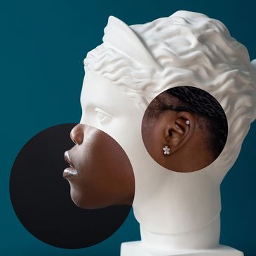 Contemporary collage of plaster statue head and beautiful African American woman in profile.