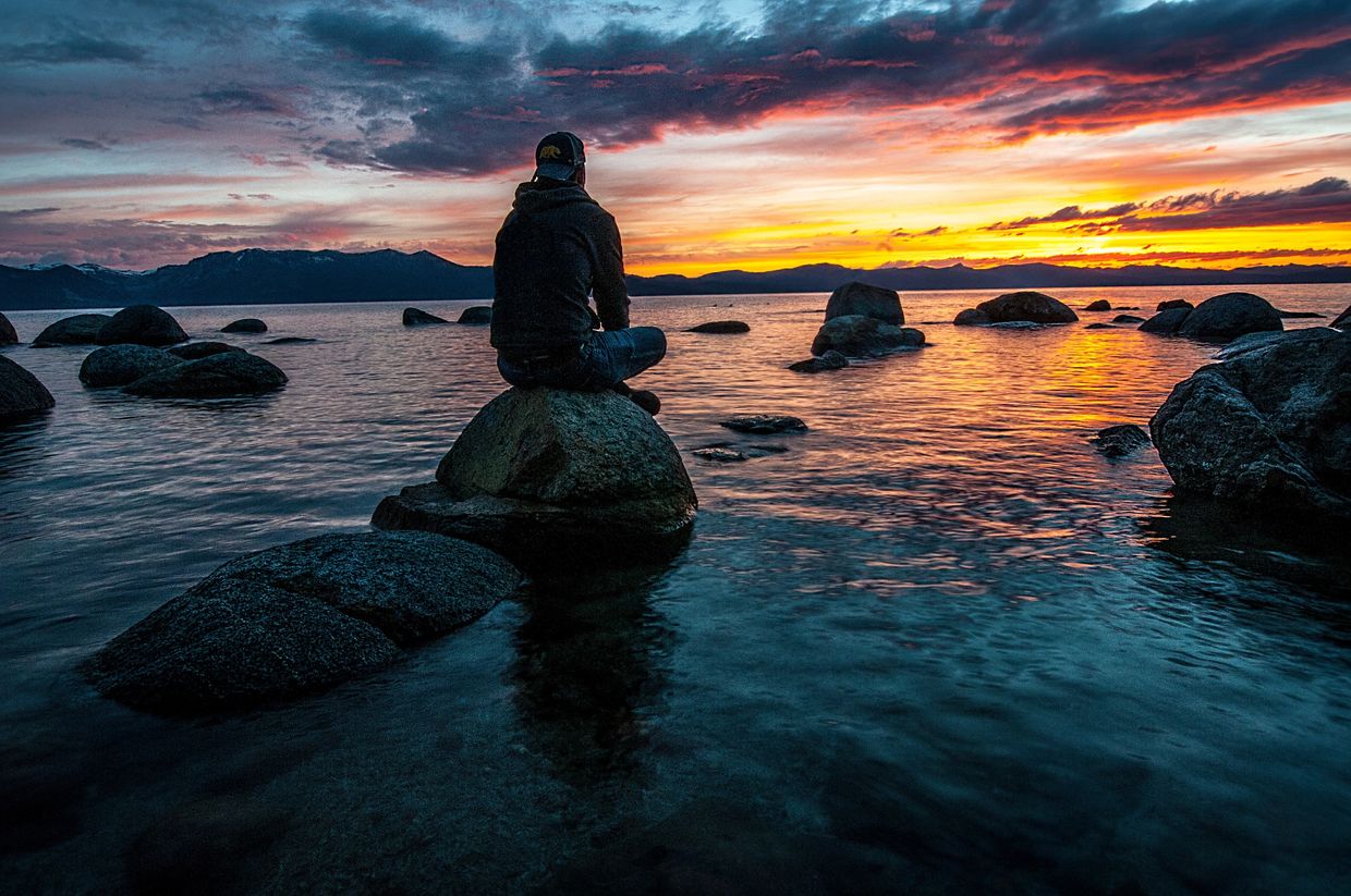Man practicing mindfulness for improved mental health as he struggles with depression.
