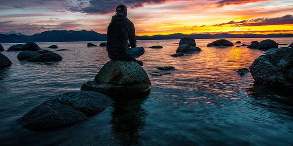 Sitting by the water and reflecting on mental health with Pyscophi | Mental Health Solutions