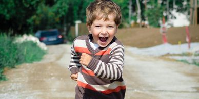 child mindful walking with a smiling face and great mental health