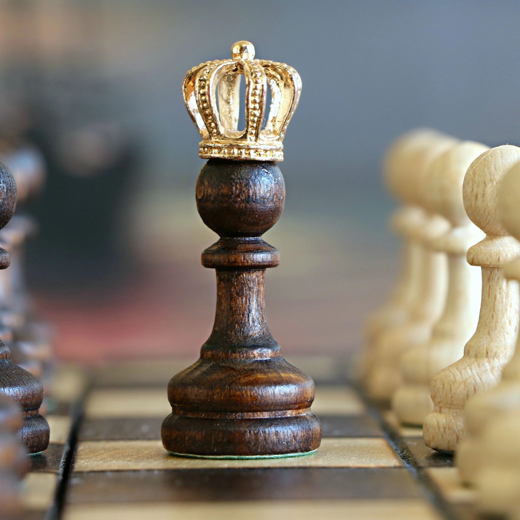 The importance of self-care: Chess piece with a crown representing mental health