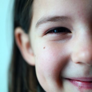 Girl with ADHD smiling with journey towards mental health at Psycophi