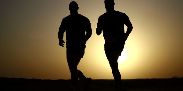 Running at sunset for mental health and well-being