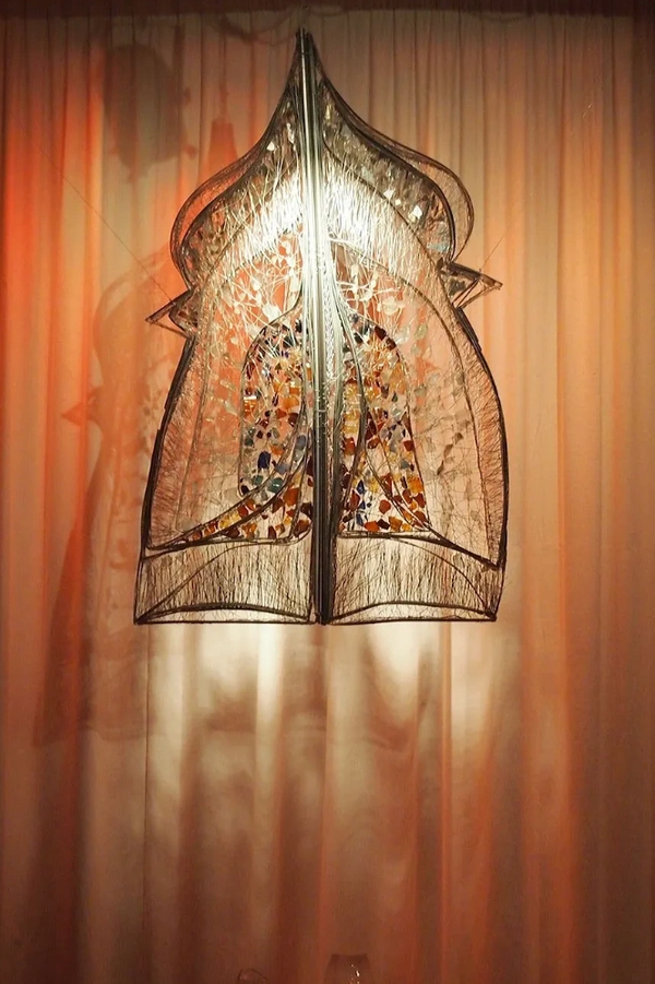 Creative metal structure with shadows and reflections.