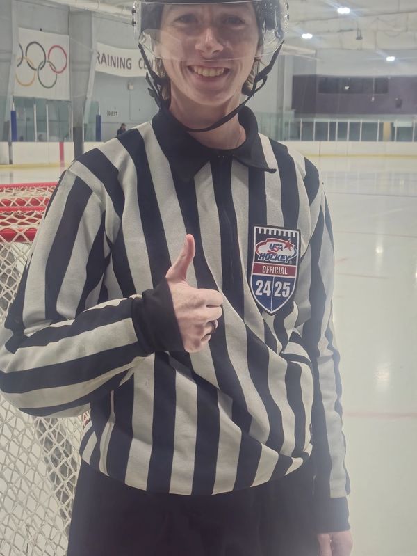 Local referee (Evan Grigsby) gets ready for some friday night lights!