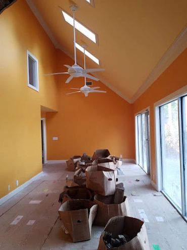 Orange sunroom painting by ipaint in Murfreesboro. Sherwin Williams color. Interior room Painting