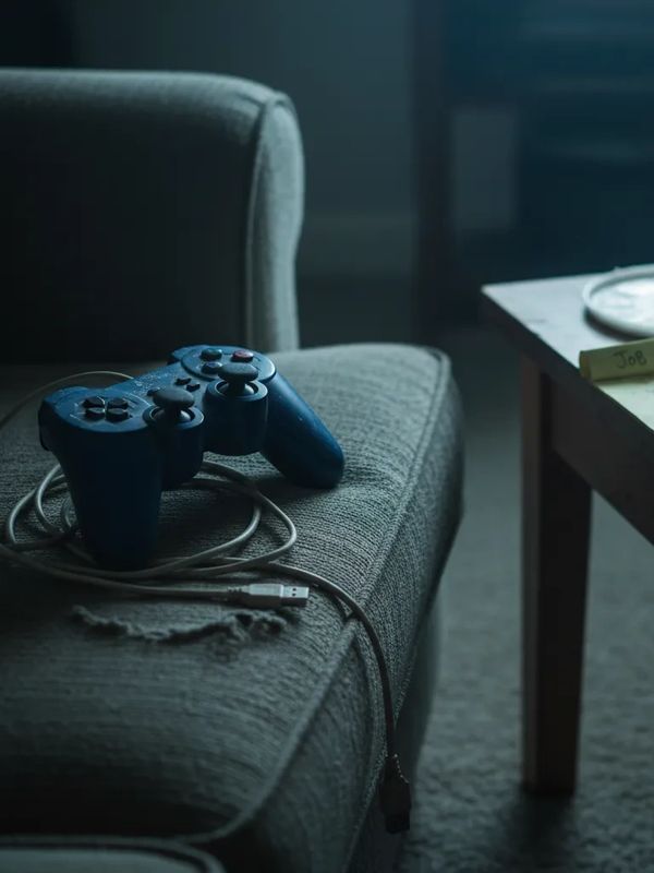 a playstation on a sofa