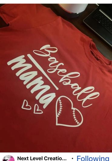 Red T-shirt with "Baseball Mama" text and heart-shaped baseball design.