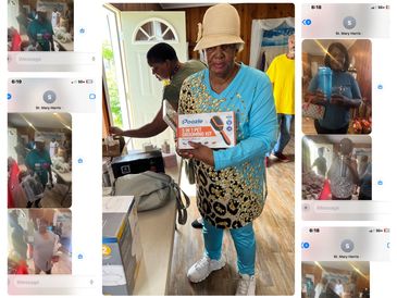 Group of individuals receiving much needed household items!