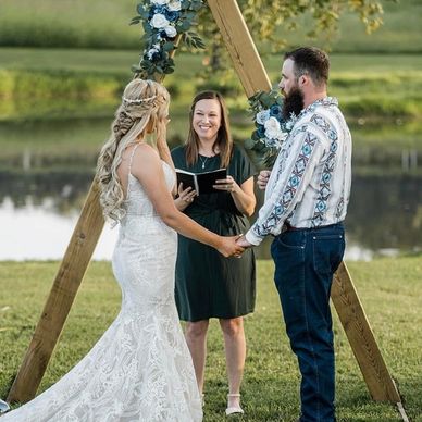 Officiant in Front of Triangle Arbor at Lake at Country Club