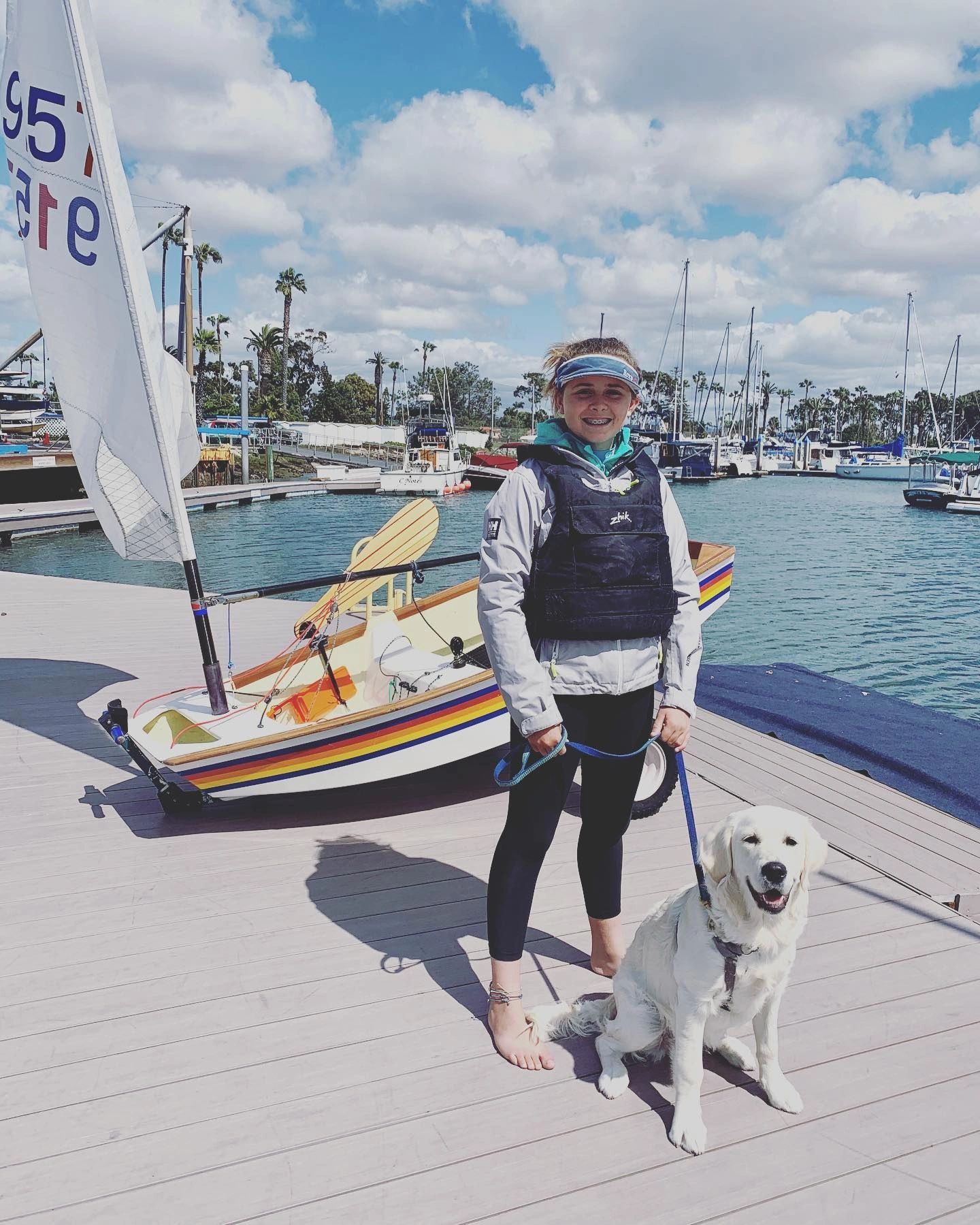 Sailor loves coming to the yacht club and watching me sail!