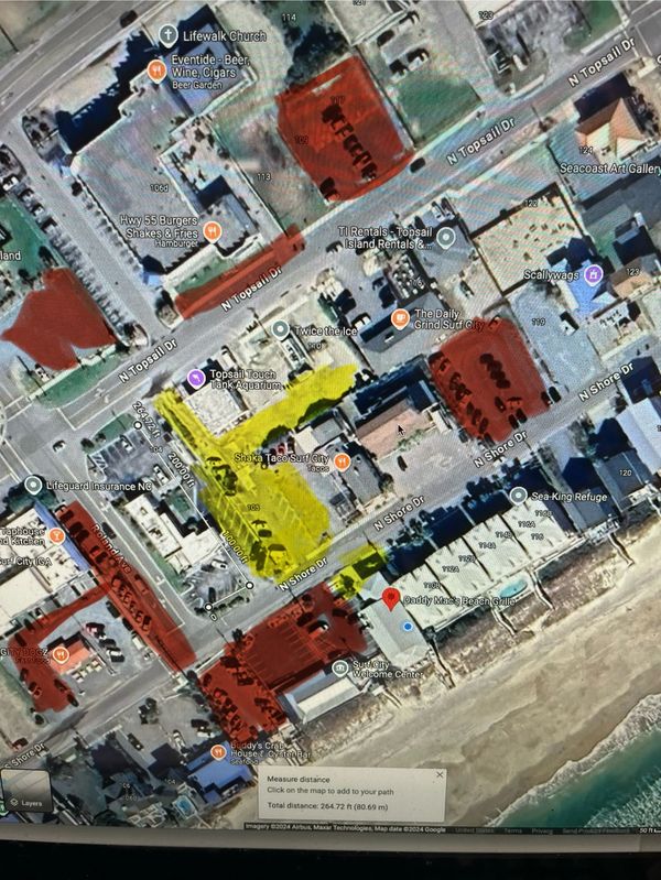 RED-  Paid parking from April to October, 8am - 6pm daily
YELLOW - Daddy Mac's customer parking only