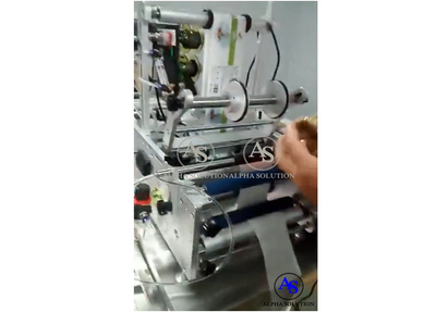 Semi Auto Labeling Machine for round bottles with date printer, allows to apply 2 labels at one time