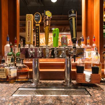 The Claddagh Irish Pub Bar tap lines and liquor bottles