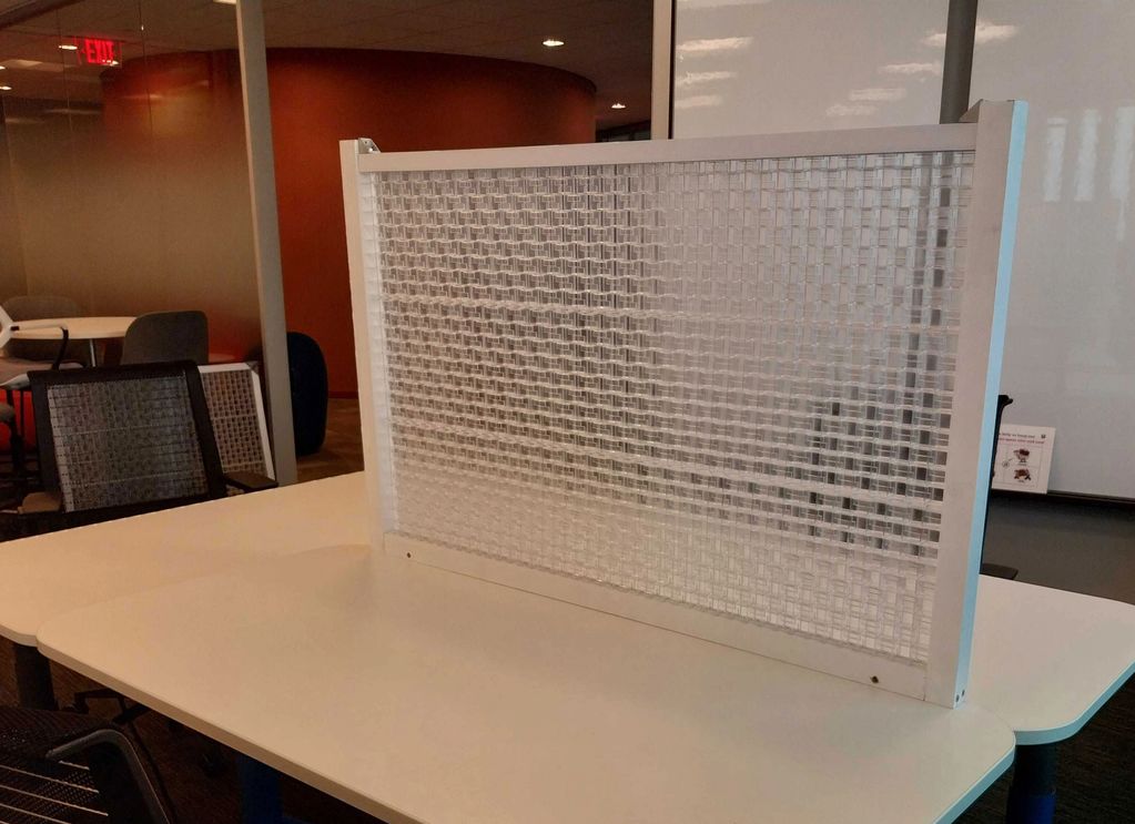 Used as transparent acoustic desk separator for standard desks