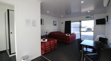 Double Studio with Queen and Single Bed in Open Plan Studio.