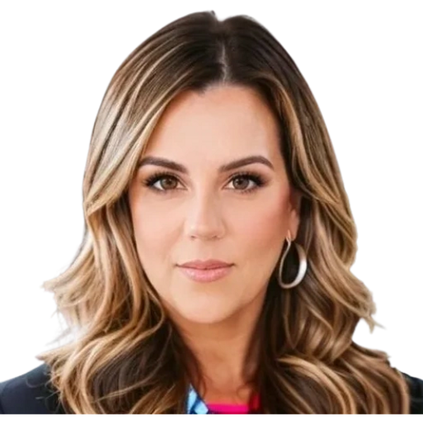 Professional woman with styled blonde hair and hoop earrings.