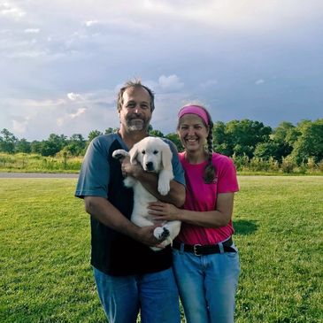 Meet the breeders David and Vanessa Sturgill with one of their beautiful Golden Retriever Puppies 
