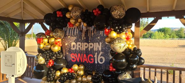 Photo Booth backdrop, Dripping Swag16 backdrop, photo booth rental, gold, red, and black balloons