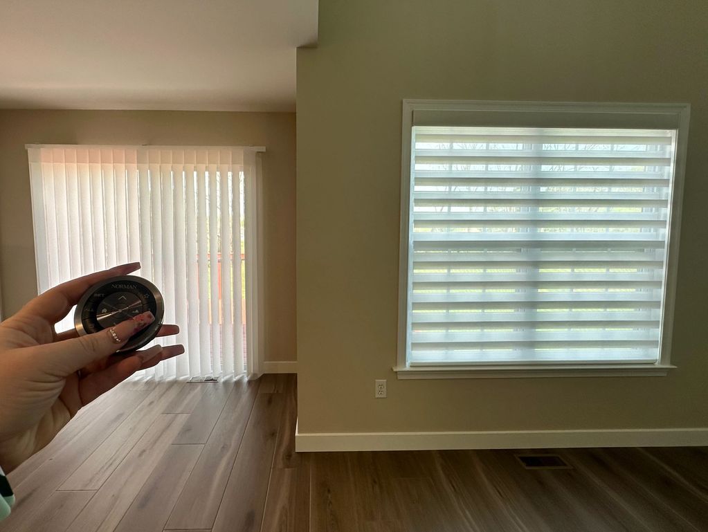 Motorized vertical sheer shade and sheer shade.