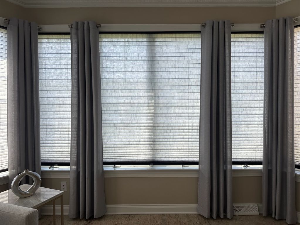Cordless honeycomb Shades with grommet top side panels. (cellular shades)