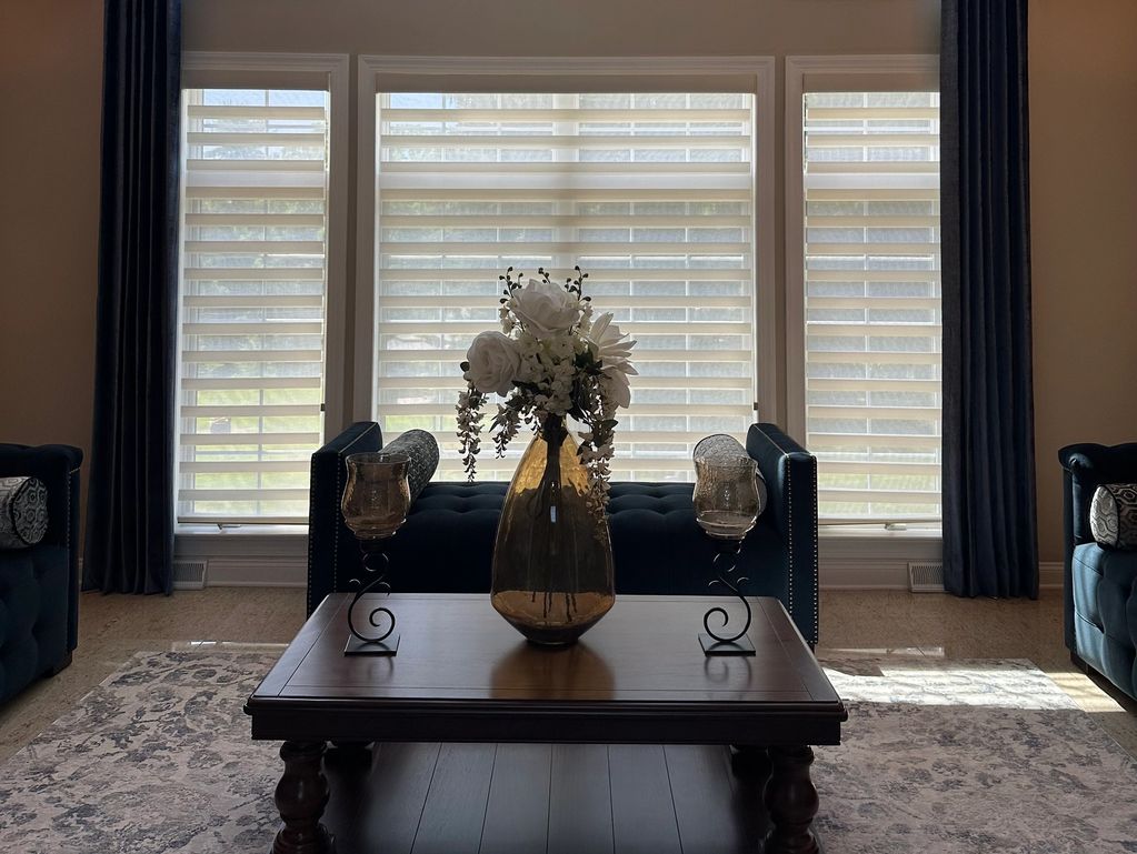 Continuous cord loop sheer shades in formal foyer sitting area.