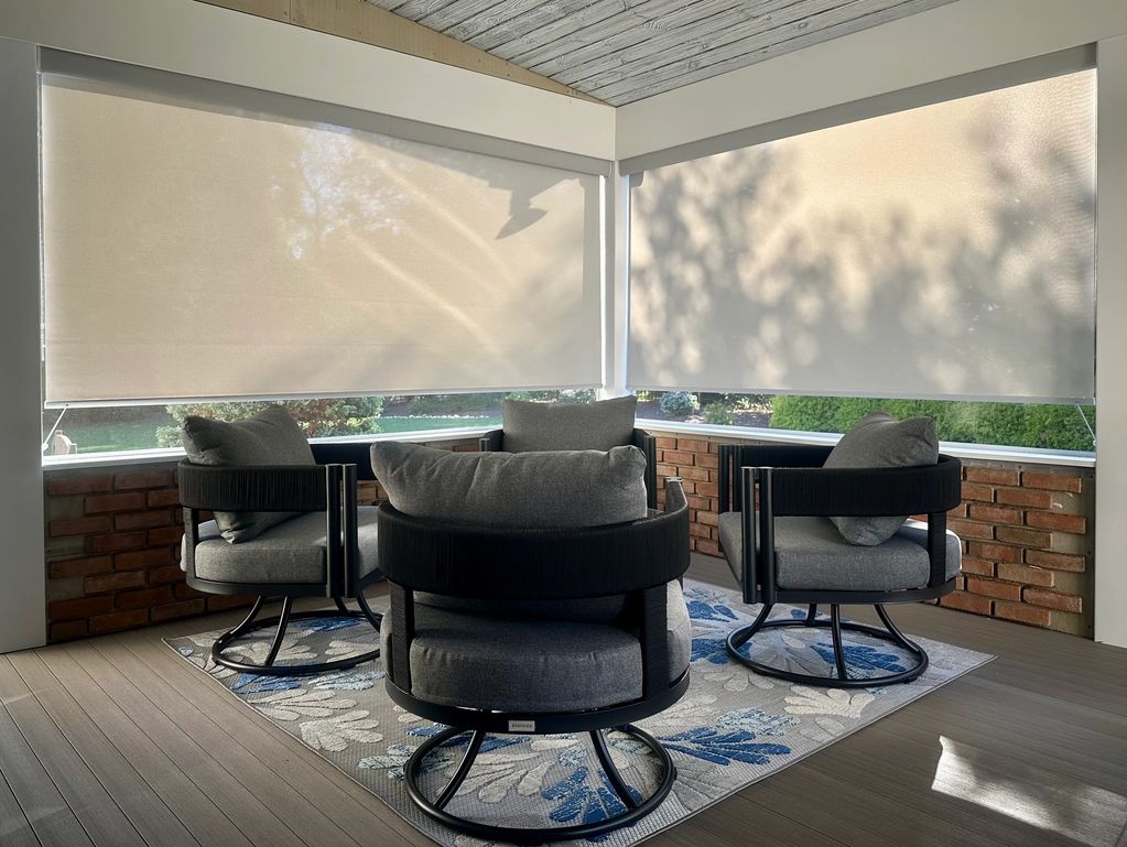 Roller shades on an enclosed porch.