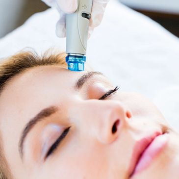 female receiving custom Hydrafacial